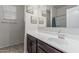 Bathroom featuring a sink, a mirror and decorative art hanging on the wall at 30954 W Whitton Ave, Buckeye, AZ 85396