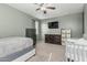 Comfortable bedroom features a neutral color palette and ceiling fan at 30954 W Whitton Ave, Buckeye, AZ 85396
