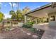 Backyard with covered patio, grilling area and mature vegetation at 315 E Marlette Ave, Phoenix, AZ 85012