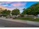 Charming single-story home with mature trees and a well-maintained front yard at 315 E Marlette Ave, Phoenix, AZ 85012