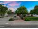 Charming single-story home with mature trees and a well-maintained front yard at 315 E Marlette Ave, Phoenix, AZ 85012