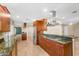 Spacious kitchen with granite countertops, stainless steel appliances, and ample cabinet space at 315 E Marlette Ave, Phoenix, AZ 85012
