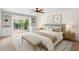 Cozy main bedroom with a sliding glass door, built-in shelving, and neutral tones throughout at 315 E Marlette Ave, Phoenix, AZ 85012