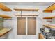Organized storage space with shelving and pegboards for tools and supplies at 315 E Marlette Ave, Phoenix, AZ 85012