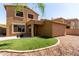 A backyard with artificial turf, pavers, and low-maintenance landscaping at 34710 N 27Th Ave, Phoenix, AZ 85086