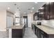 Spacious kitchen featuring a large center island, stainless steel appliances, and plenty of cabinet space at 34710 N 27Th Ave, Phoenix, AZ 85086