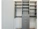 Organized walk-in closet with shelving and drawers to maximize storage at 37200 N Cave Creek Rd # 1013, Scottsdale, AZ 85262