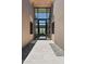 Stunning two-story foyer featuring a wall of windows offering bright, natural light and beautiful outdoor views at 37200 N Cave Creek Rd # 1013, Scottsdale, AZ 85262