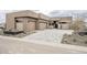 Stunning modern home with a spacious driveway and desert landscaping at 37200 N Cave Creek Rd # 1013, Scottsdale, AZ 85262