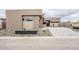 Beautiful single-story home featuring desert landscaping and a stone driveway at 37200 N Cave Creek Rd # 1013, Scottsdale, AZ 85262