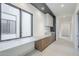 Bright hallway featuring built-in cabinets, drawers, and a spacious window seat that offers plenty of natural light at 37200 N Cave Creek Rd # 1013, Scottsdale, AZ 85262