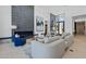 Inviting living room features a modern fireplace, stylish decor, and large windows for ample natural light at 37200 N Cave Creek Rd # 1013, Scottsdale, AZ 85262