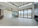 Bright open living room with mountain views, modern fireplace and wine storage at 37200 N Cave Creek Rd # 1013, Scottsdale, AZ 85262