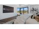 Main bedroom with floor to ceiling glass doors offers abundant natural light and views at 37200 N Cave Creek Rd # 1013, Scottsdale, AZ 85262