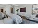 Bedroom featuring sleek design with an area rug, furniture, and wall art at 37200 N Cave Creek Rd # 1013, Scottsdale, AZ 85262