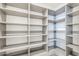 Spacious walk-in pantry with ample shelving for organized storage at 37200 N Cave Creek Rd # 1013, Scottsdale, AZ 85262