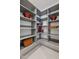 Organized pantry featuring custom shelving, ample storage, and space for kitchen essentials at 37200 N Cave Creek Rd # 1013, Scottsdale, AZ 85262