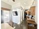 Dining area leads to the kitchen, living room, and outdoor patio at 381 S Gypsum Dr, Apache Junction, AZ 85119