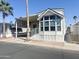 Attractive single-story home with covered parking, showcasing a clean and modern design at 381 S Gypsum Dr, Apache Junction, AZ 85119