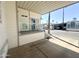 Cozy covered front porch providing shade and a relaxing outdoor retreat with community views at 381 S Gypsum Dr, Apache Junction, AZ 85119