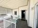 Welcoming front porch with seating near front door offers a tranquil outdoor space for relaxation at 381 S Gypsum Dr, Apache Junction, AZ 85119