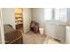 This laundry room features a walk-in pantry, closet, chair and lots of space at 381 S Gypsum Dr, Apache Junction, AZ 85119