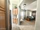 Transitional shot of a living room with neutral paint and wood cabinets at 381 S Gypsum Dr, Apache Junction, AZ 85119