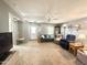 Spacious living room with natural light, plush seating, and a warm ambiance at 381 S Gypsum Dr, Apache Junction, AZ 85119