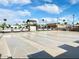 Shuffleboard area with benches and community gazebo in background at 381 S Gypsum Dr, Apache Junction, AZ 85119