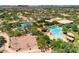 Aerial view of a community center with a pool, sports courts, and meticulously kept grounds at 3841 E Patrick Ln, Phoenix, AZ 85050