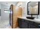 Well-appointed bathroom with a sauna, modern vanity, and stylish decor at 3841 E Patrick Ln, Phoenix, AZ 85050