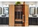 Modern bathroom with an infrared sauna, dual vanities, and stylish fixtures at 3841 E Patrick Ln, Phoenix, AZ 85050