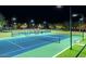 Illuminated tennis courts offer nighttime play in a well-maintained recreational area at 3841 E Patrick Ln, Phoenix, AZ 85050