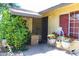 Inviting front porch with decorative plants and secure front door at 4116 N 78Th Ave, Phoenix, AZ 85033