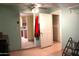 Interior with a kitchen visible and tiled flooring at 4116 N 78Th Ave, Phoenix, AZ 85033