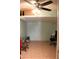 Interior space with tiled flooring and an office setup at 4116 N 78Th Ave, Phoenix, AZ 85033