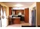Well-lit kitchen with stainless steel appliances and ample cabinet space at 4116 N 78Th Ave, Phoenix, AZ 85033