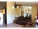 Cozy living room with comfortable leather seating and decorative lighting at 4116 N 78Th Ave, Phoenix, AZ 85033