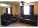 Spacious living room with tile flooring and large windows for natural light at 4116 N 78Th Ave, Phoenix, AZ 85033