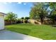 This meticulously maintained backyard features lush lawn and mature shade trees at 4314 E Montecito Ave, Phoenix, AZ 85018