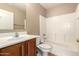 Bathroom featuring a tub-shower combo, single sink vanity and tile flooring at 4347 W Darrel Rd, Laveen, AZ 85339