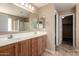Bathroom featuring double sinks, a large mirror, and a separate shower at 4347 W Darrel Rd, Laveen, AZ 85339