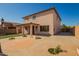 Back exterior view of a two story home with patio at 4347 W Darrel Rd, Laveen, AZ 85339
