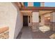 Welcoming front porch with stone accents, leading to the front door at 4347 W Darrel Rd, Laveen, AZ 85339