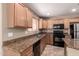 Well-equipped kitchen with granite countertops and modern appliances at 4347 W Darrel Rd, Laveen, AZ 85339