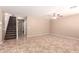 Inviting living room featuring tile flooring and stairway at 4347 W Darrel Rd, Laveen, AZ 85339