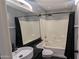 Bathroom featuring a shower-tub combo and modern vanity with vessel sink at 5311 W Fulton St, Phoenix, AZ 85043