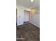 Bedroom with carpet and built-in closet painted in pink at 5311 W Fulton St, Phoenix, AZ 85043
