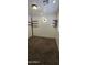 Bedroom features contemporary lighting, carpet, and built-in shelving for modern storage solutions at 5311 W Fulton St, Phoenix, AZ 85043