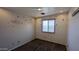 Bedroom features an accent wall with cherry blossoms and butterflies at 5311 W Fulton St, Phoenix, AZ 85043